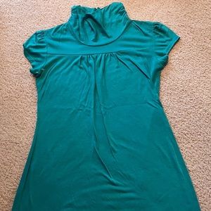 Green short sleeved turtle neck top